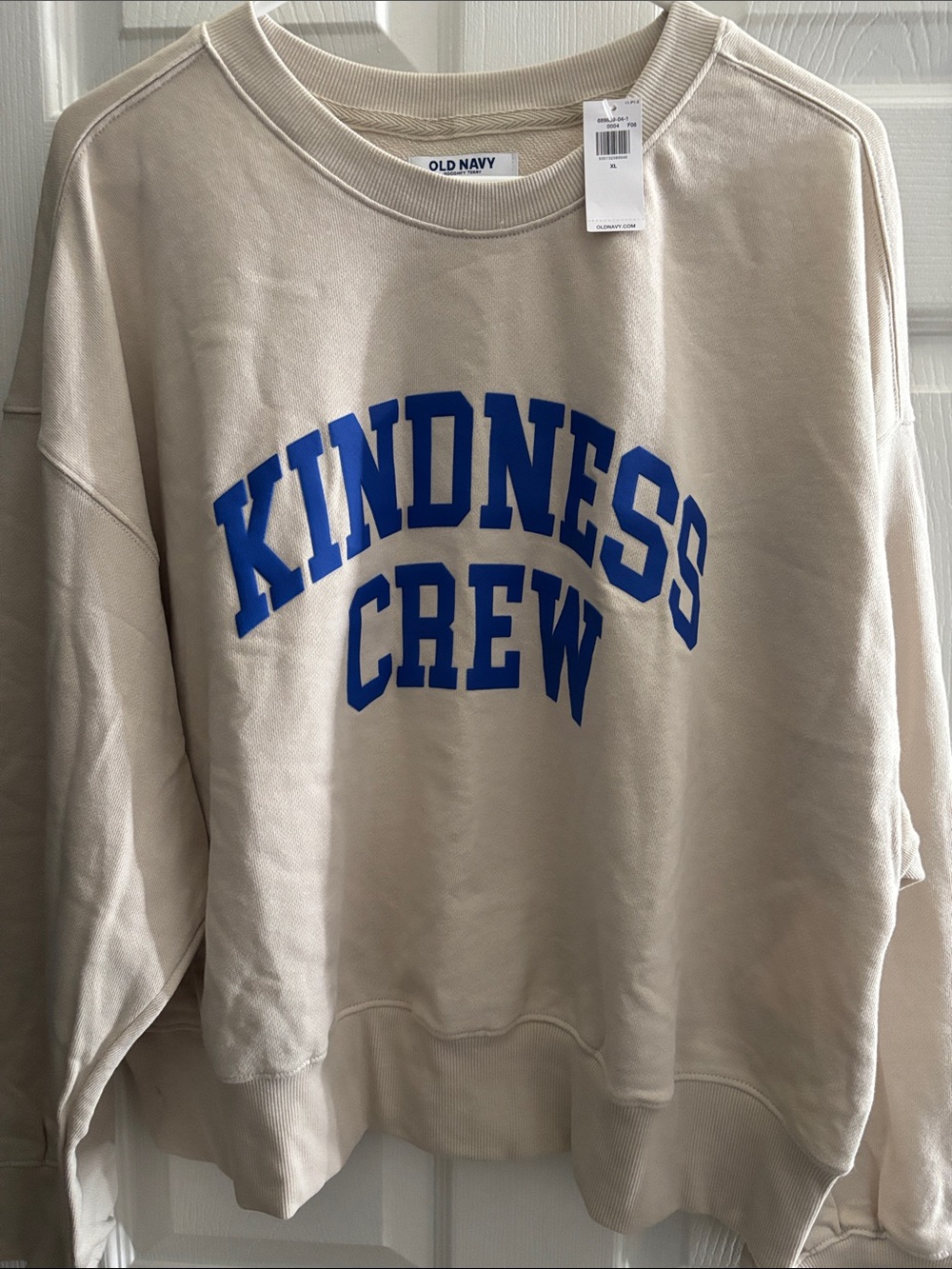Old Navy Cream Crewneck Sweatshirt with Blue "Kindness Crew" Graphic